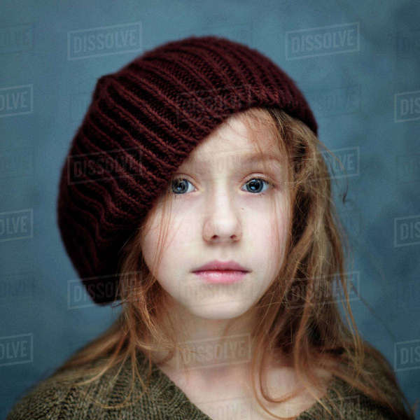 Caucasian teenage girl wearing beanie 