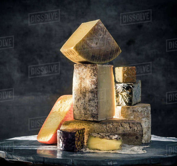 Pile of variety of cheeses Stock Photo Dissolve