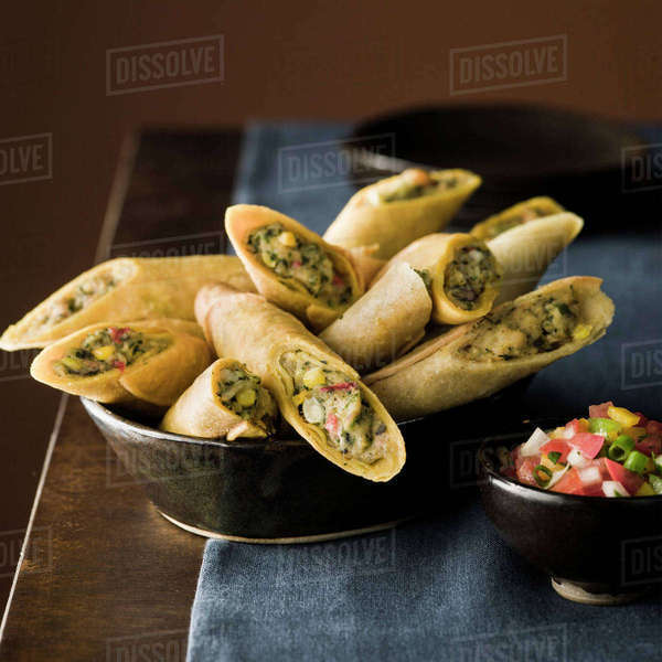 Taquitos in bowl Stock Photo Dissolve