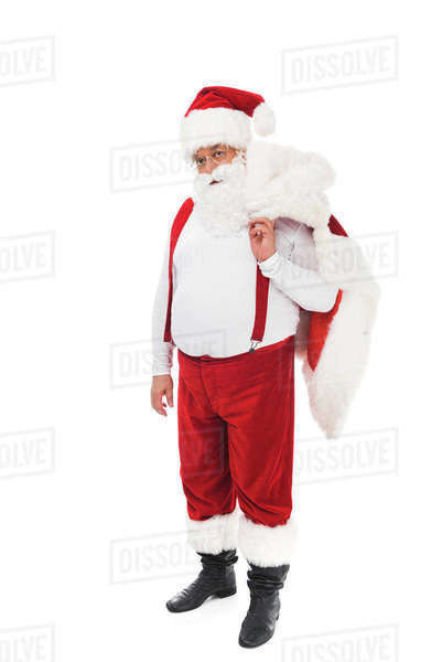 full length view of santa claus in suspenders standing isolated on