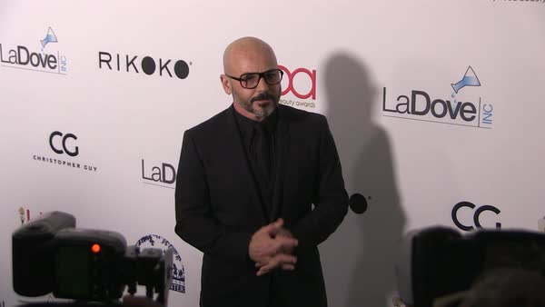Hair Stylist Giannandrea Marongiu Poses On The Red Carpet Before