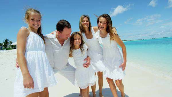family portraits white dress for family beach pictures