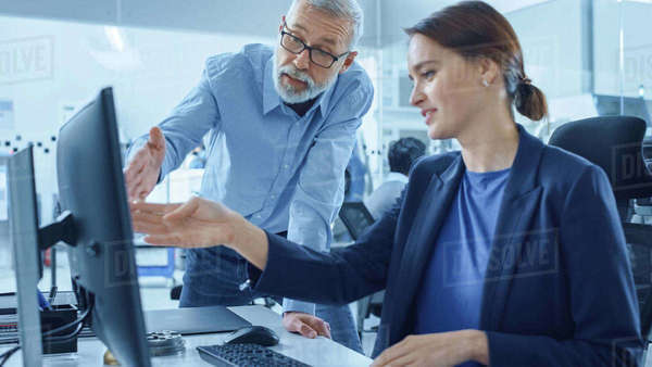 modern-factory-office-project-manager-supervisor-talk-to-a-female