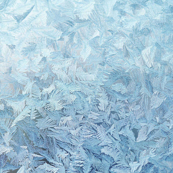 Ice crystals on glass Stock Photo Dissolve