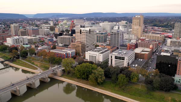 Sunrise Susquehanna River Harrisburg PA Downtown City Skyline - Stock