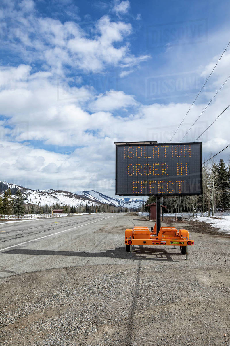 USA, Idaho, Sun Valley, COVID_19 lockdown on travel electronic sign on