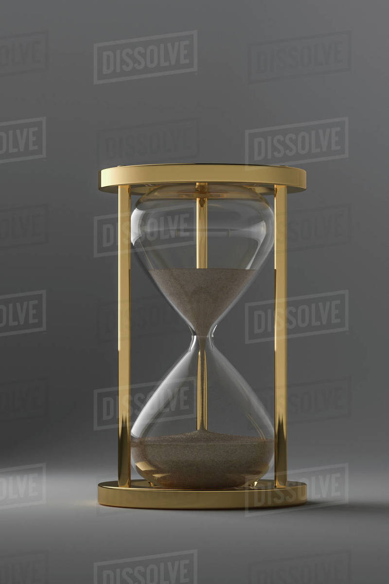 Studio shot of hourglass - Stock Photo - Dissolve