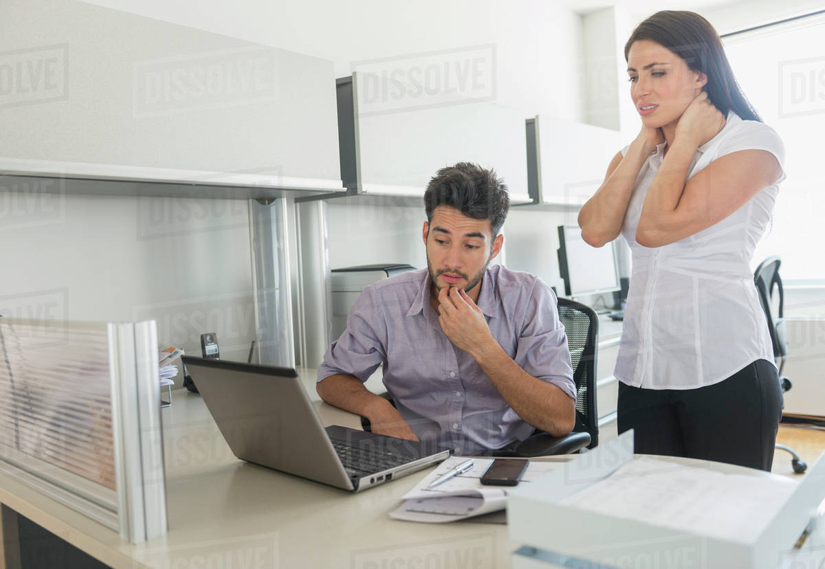 Business man and woman at work in office - Stock Photo - Dissolve