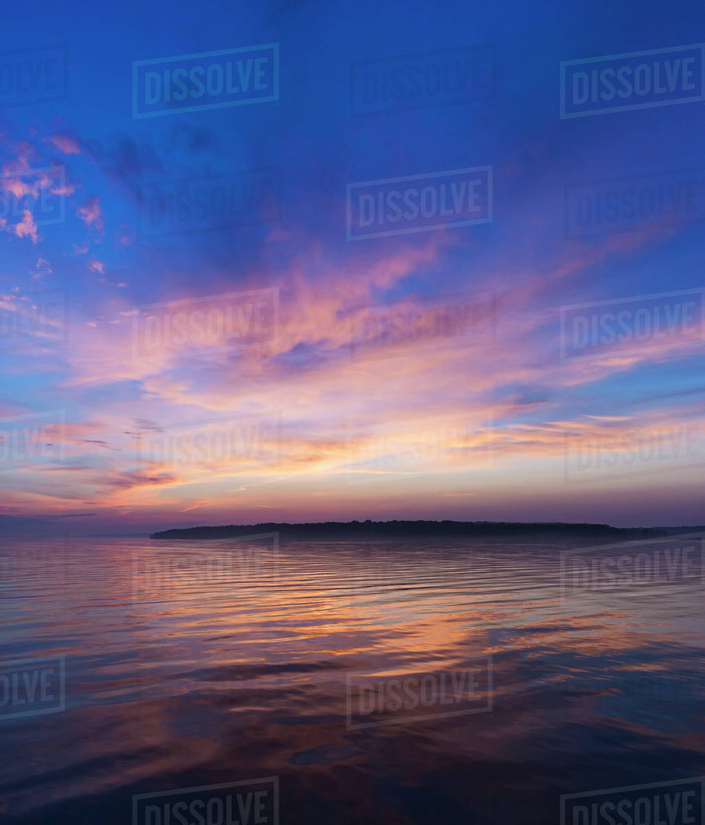 Colorful seascape at sunrise - Stock Photo - Dissolve