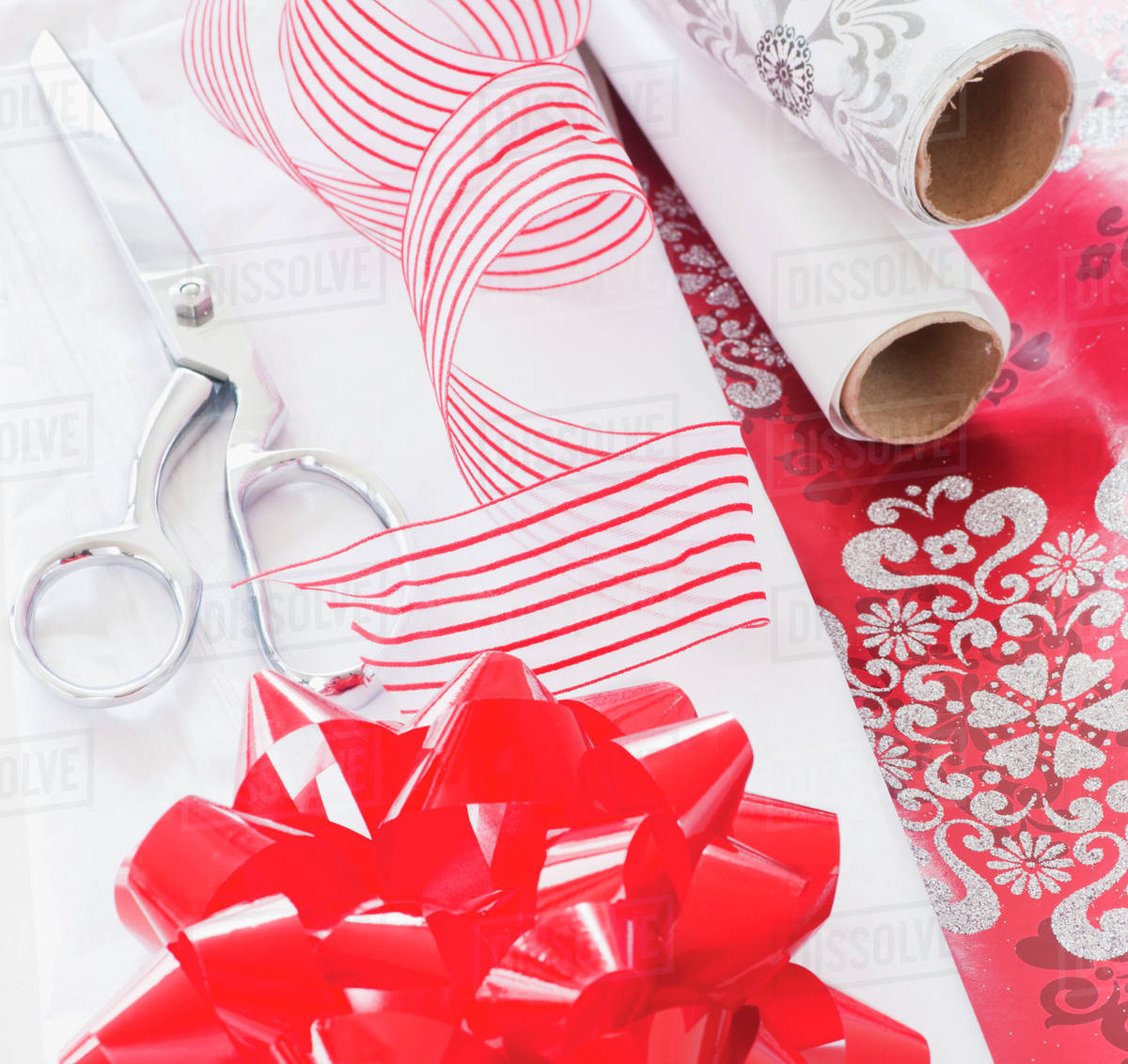 Wrapping Paper Ribbon
 Wrapping paper ribbon and scissors Stock Dissolve