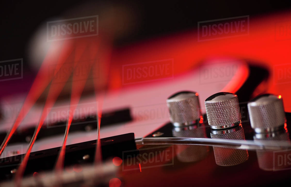Close up of volume knobs of bass guitar Stock Photo Dissolve