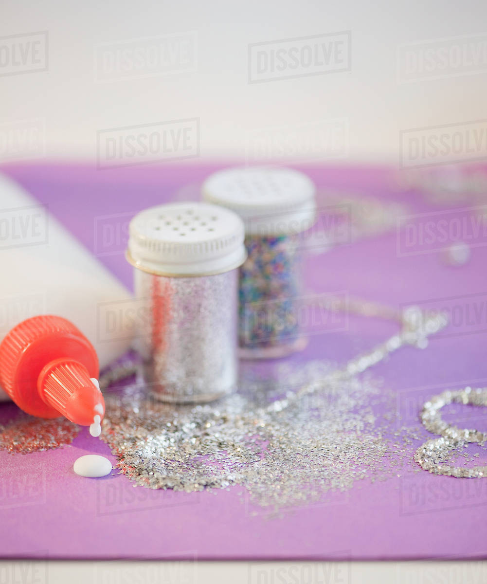 Glitter and glue Stock Photo Dissolve