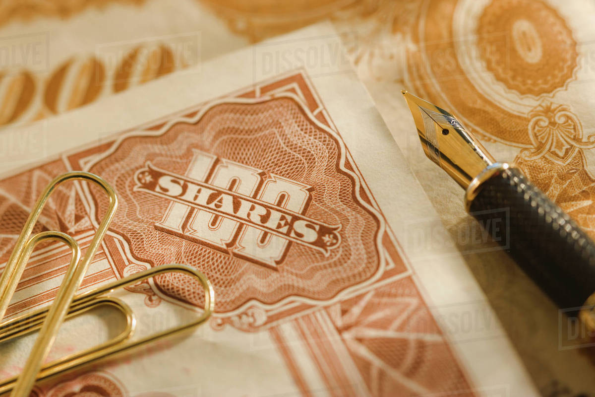 Old corporate bonds Stock Photo Dissolve