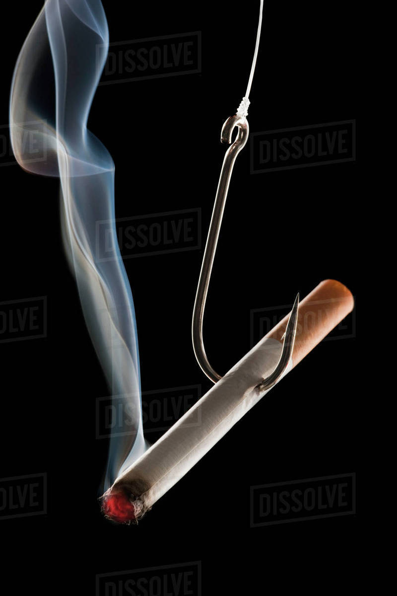 Cigarette With Fishing Hook Stock Photo Dissolve