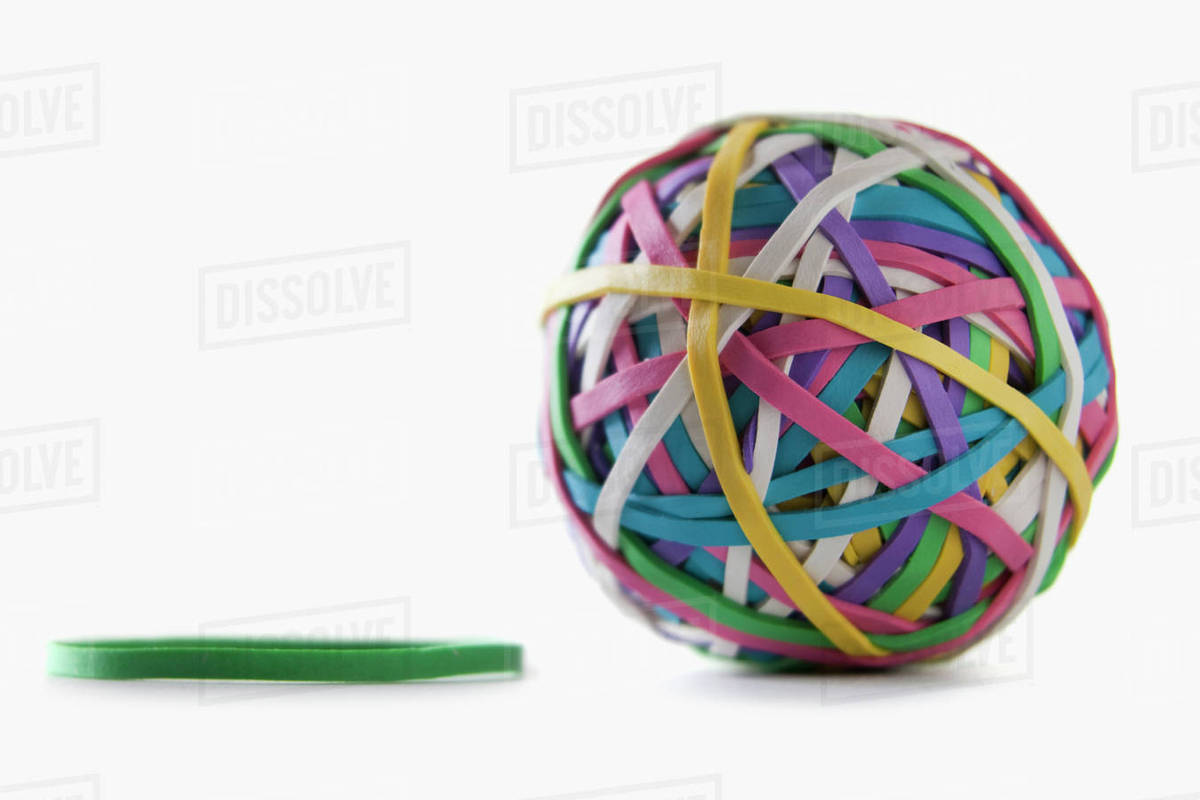 Ball of colorful rubber bands Stock Photo Dissolve
