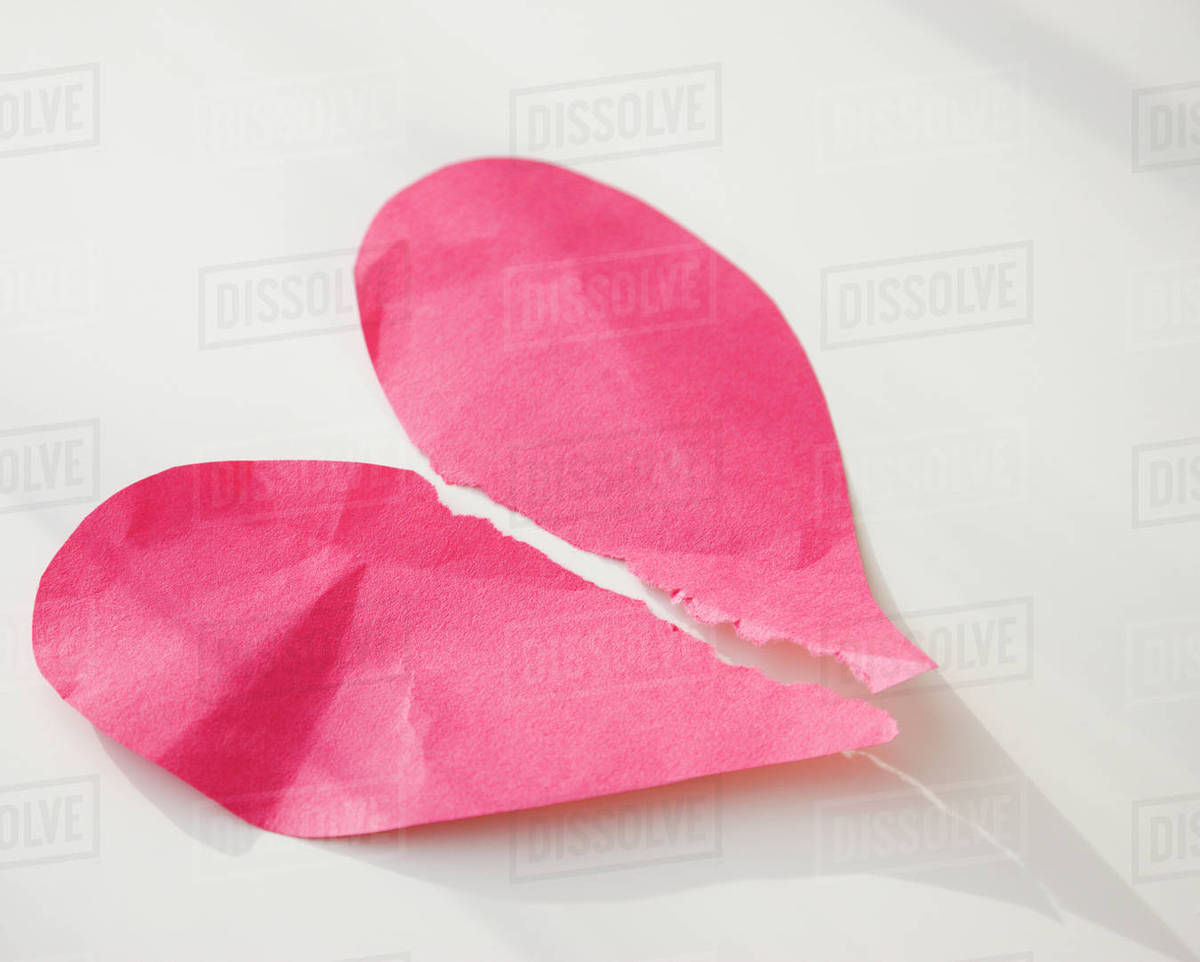 Paper heart ripped in half - Royalty-free Stock Photo | Dissolve