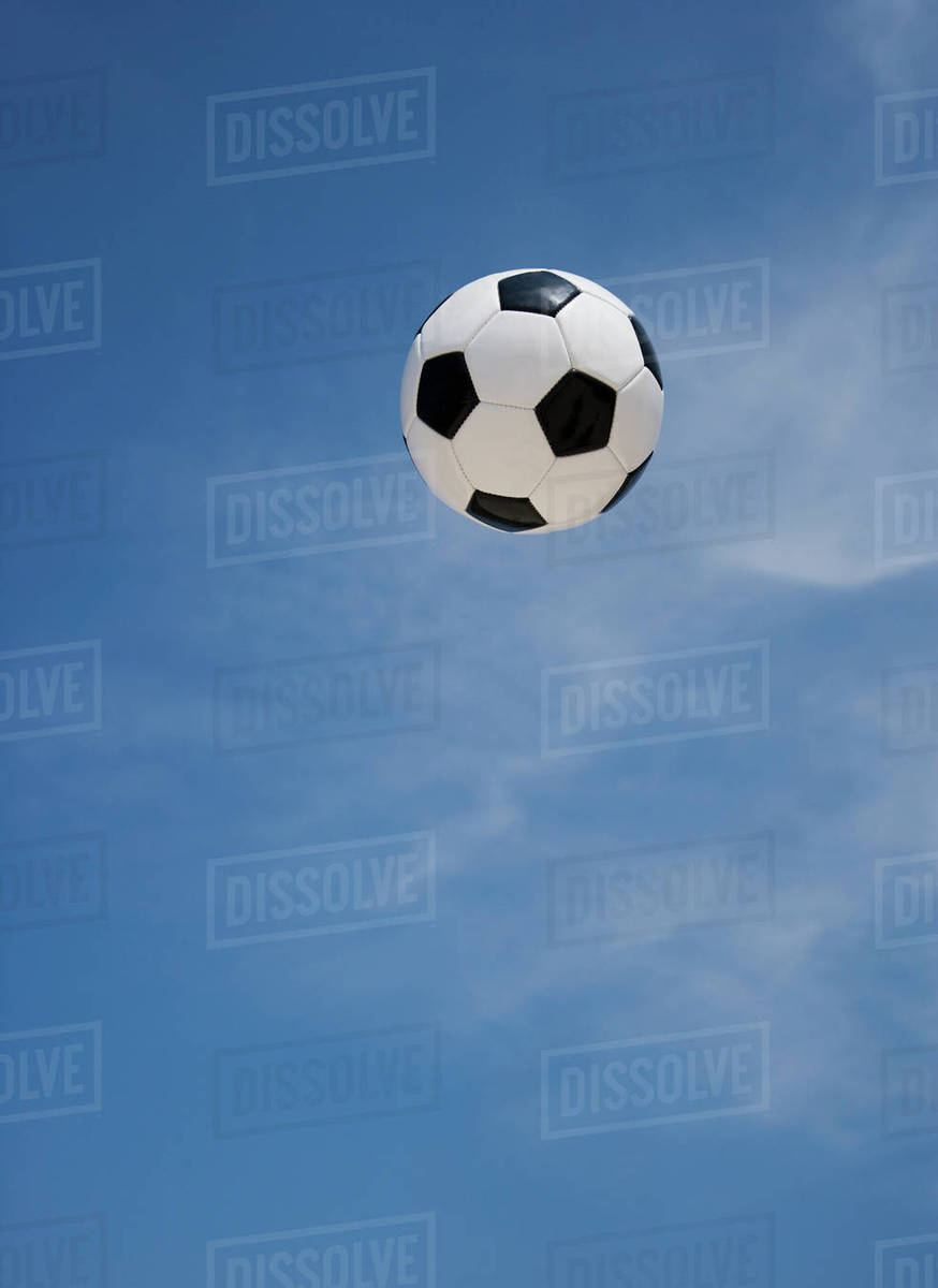 Soccer ball in air Stock Photo Dissolve