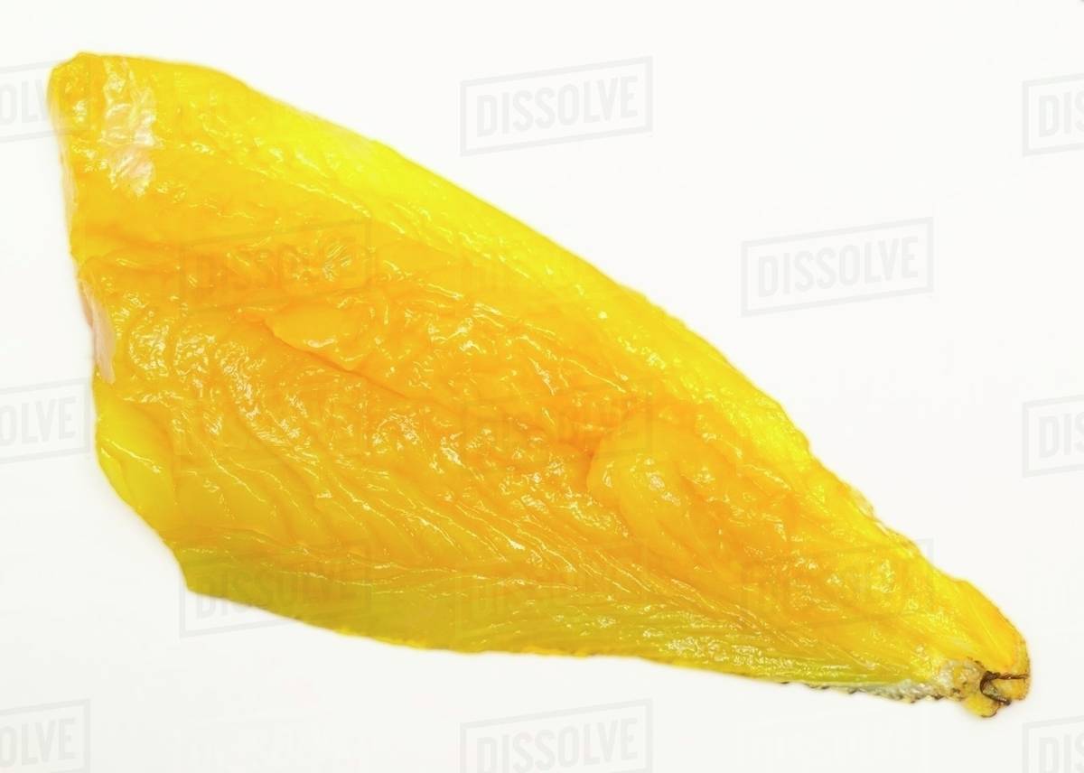 Smoked haddock fillet, dyed yellow Stock Photo Dissolve