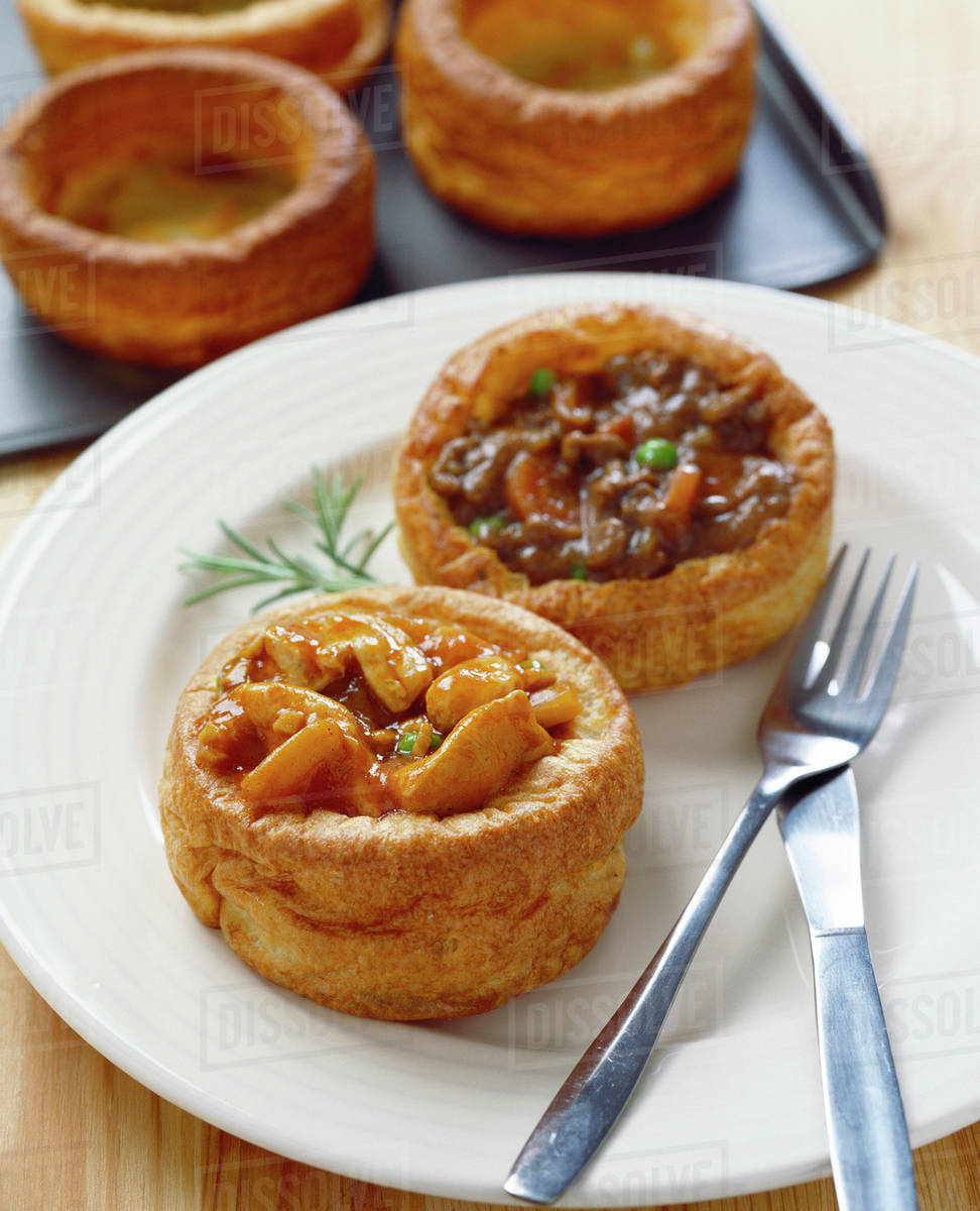 Volauvents with chicken curry and with beef Stock Photo Dissolve