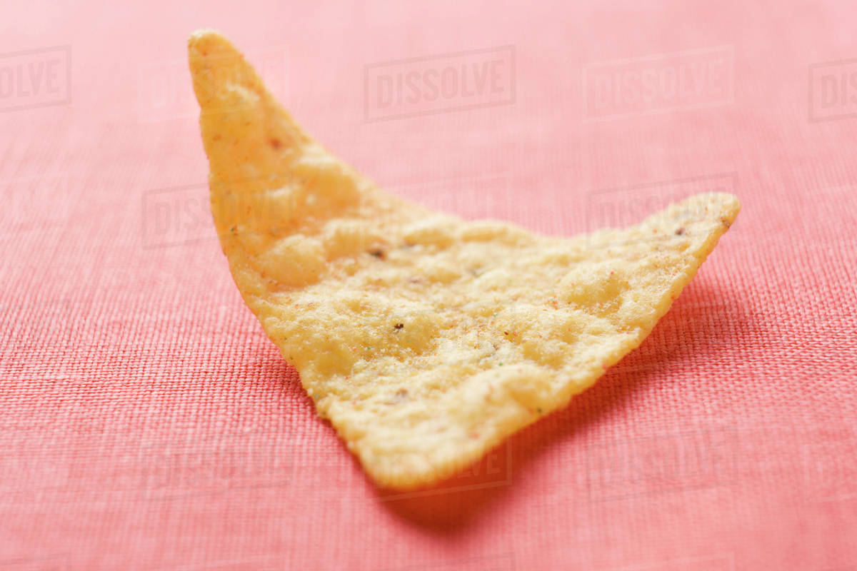 A tortilla chip Stock Photo Dissolve