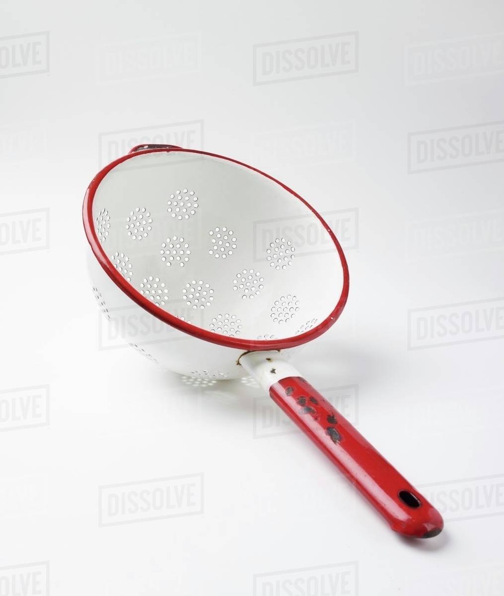 Enamel colander Stock Photo Dissolve