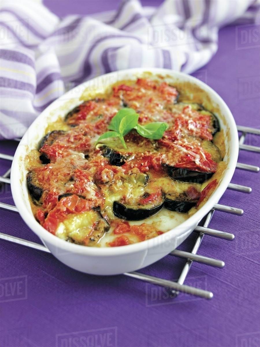 Aubergine and mozzarella bake Stock Photo Dissolve