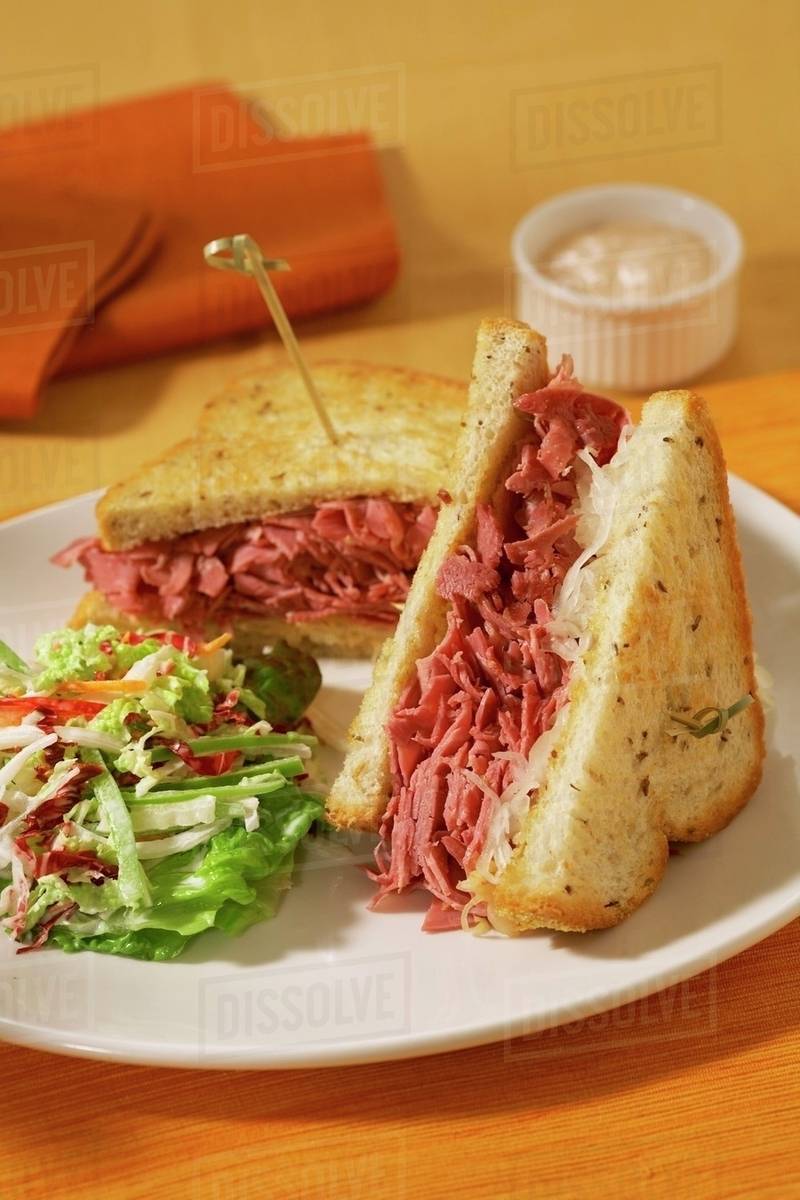 Corned Beef Sandwich with Side Salad Stock Photo Dissolve