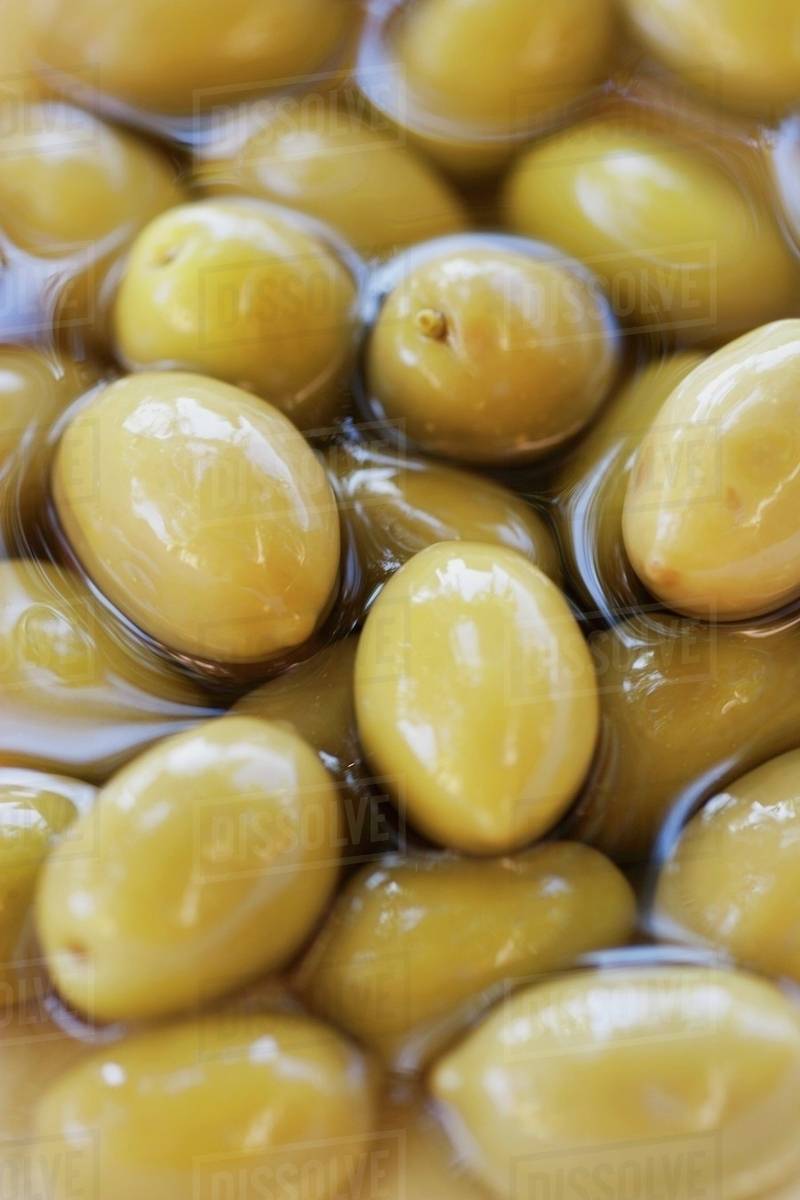 Pickled olives, fullframe Stock Photo Dissolve