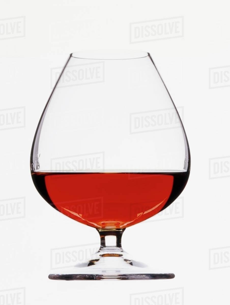 A glass of brandy Stock Photo Dissolve