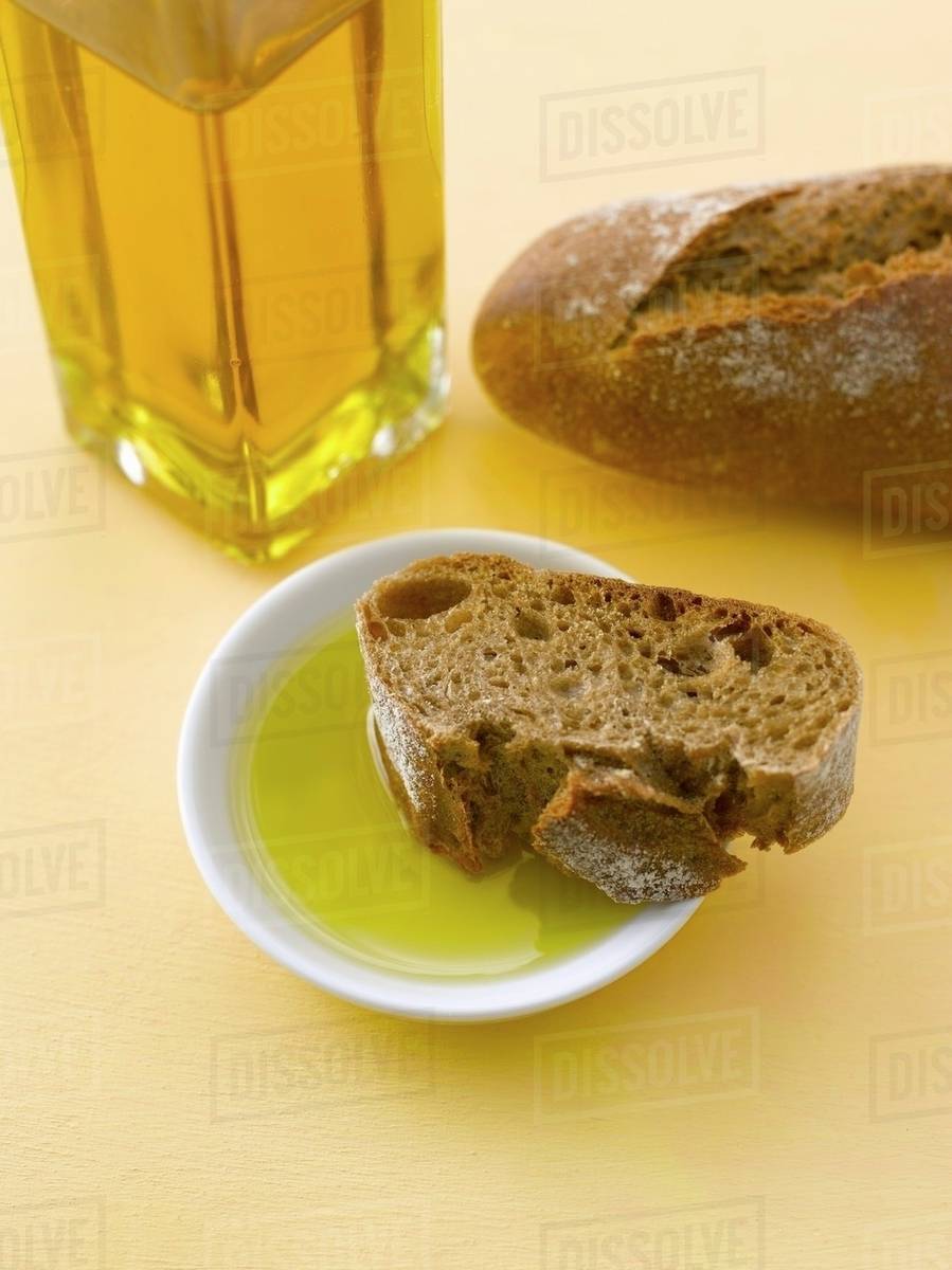 Rye baguette with olive oil Stock Photo Dissolve