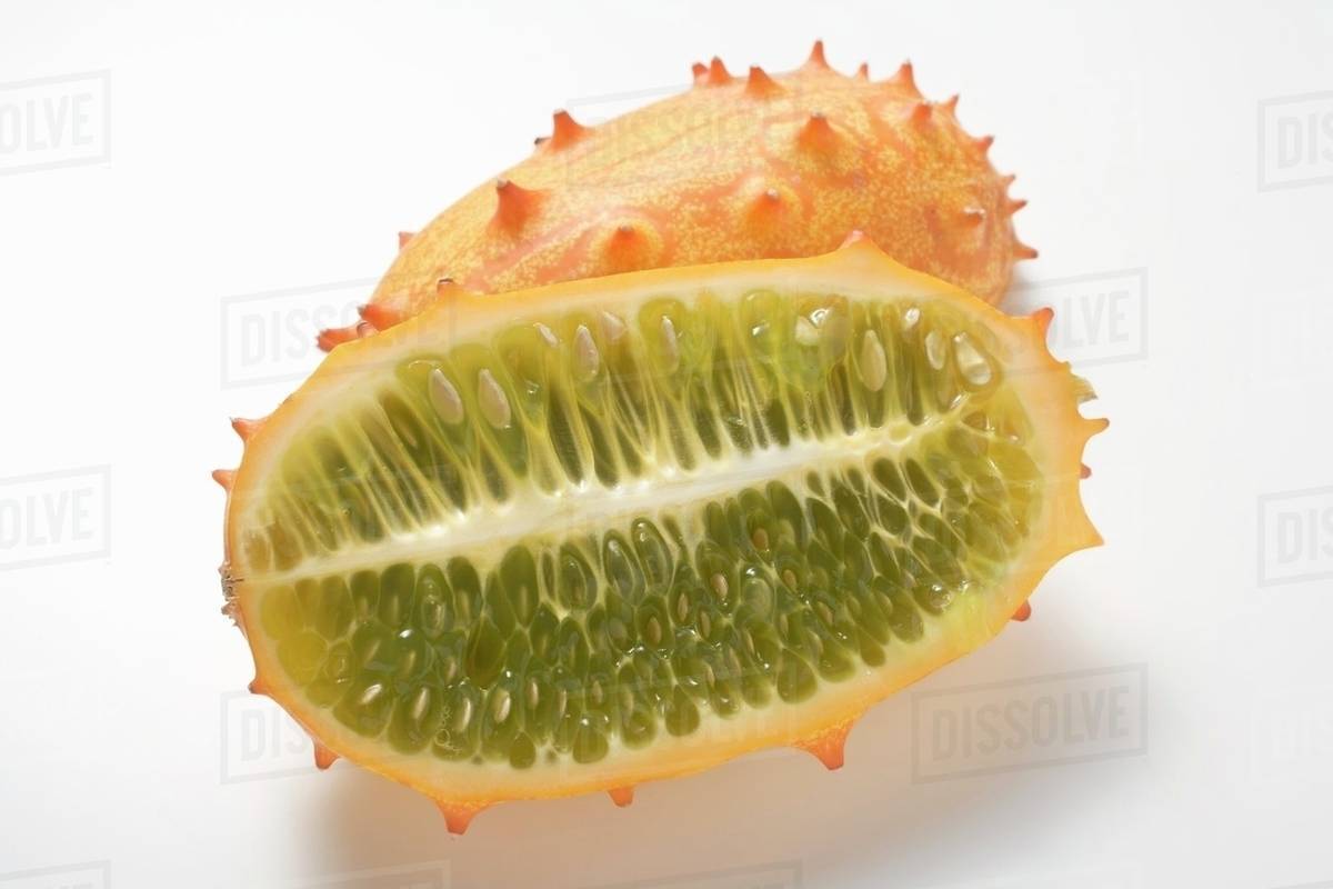 Kiwano (horned melon), halved lengthwise Stock Photo Dissolve