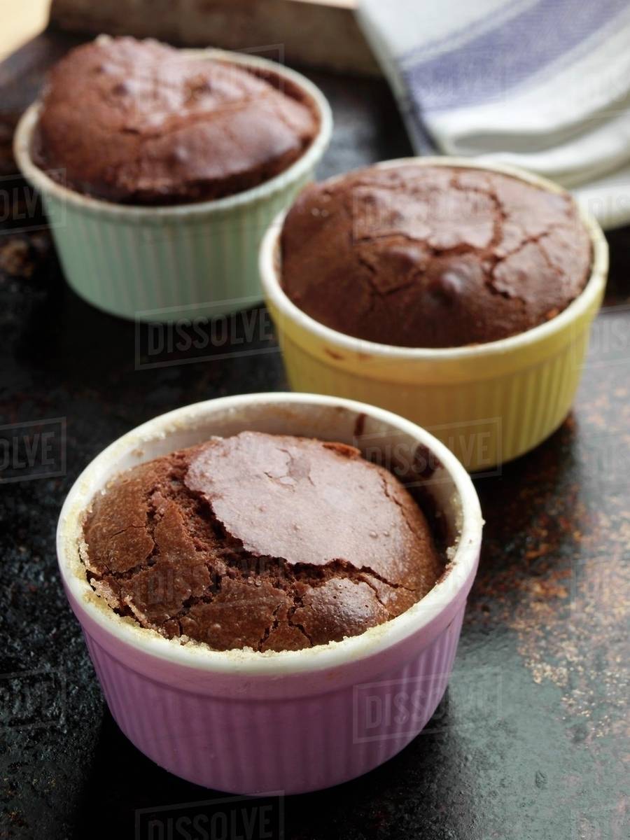 Chocolate Souffles in Ramekins Stock Photo Dissolve