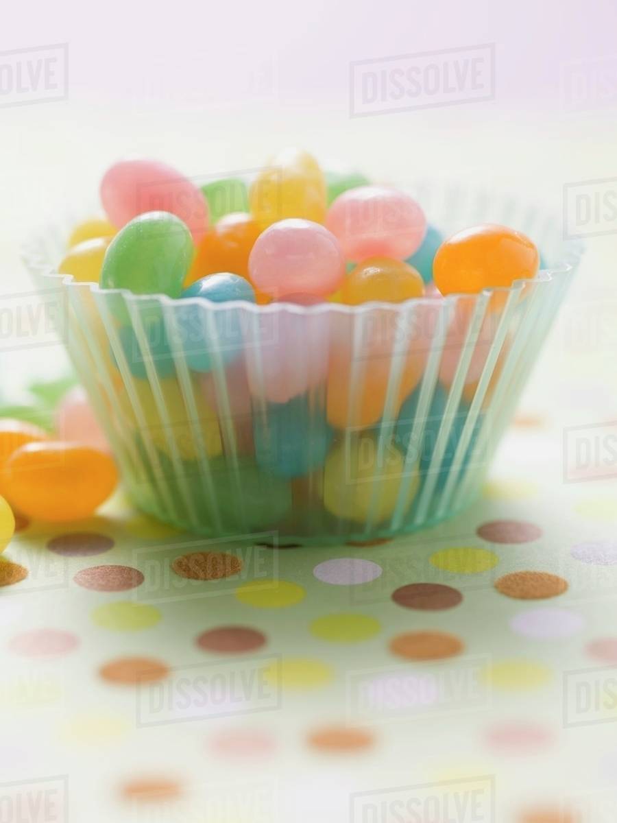 Coloured jelly beans for Easter Stock Photo Dissolve