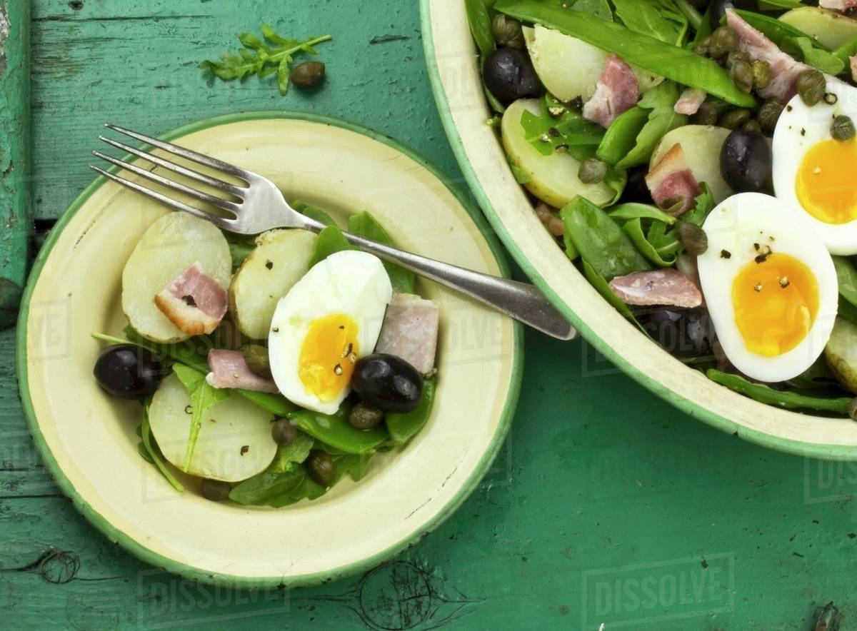 Salad Niçoise with olives, tuna fish and egg Stock Photo Dissolve