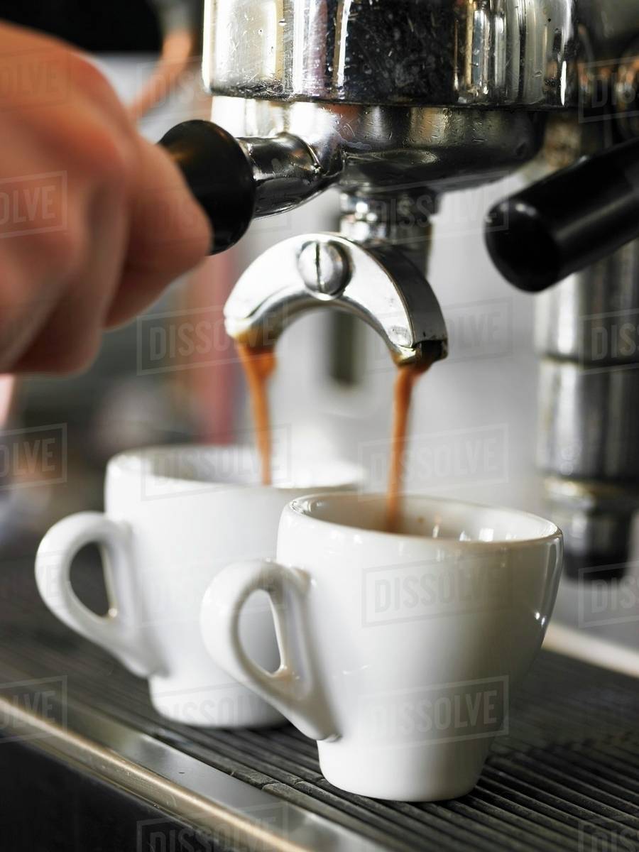 An espresso machine maker, Sweden. Stock Photo Dissolve