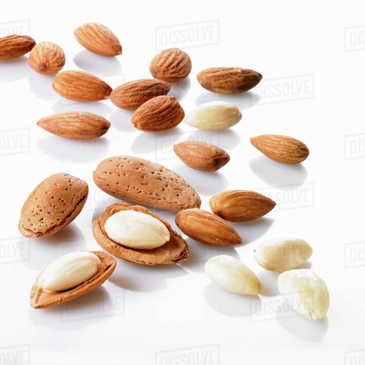 Almonds, unshelled and shelled Stock Photo Dissolve