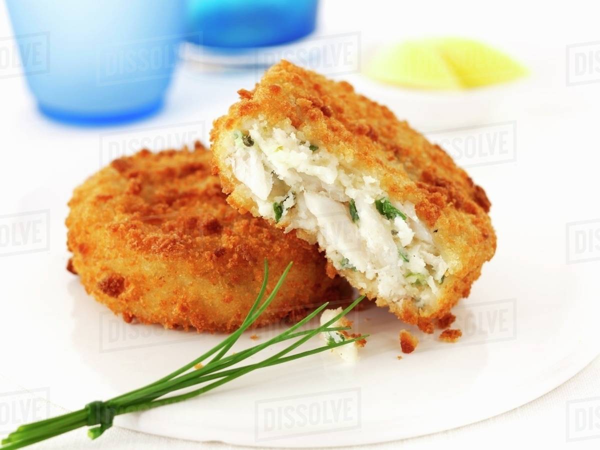 Haddock fish cakes with chives Stock Photo Dissolve