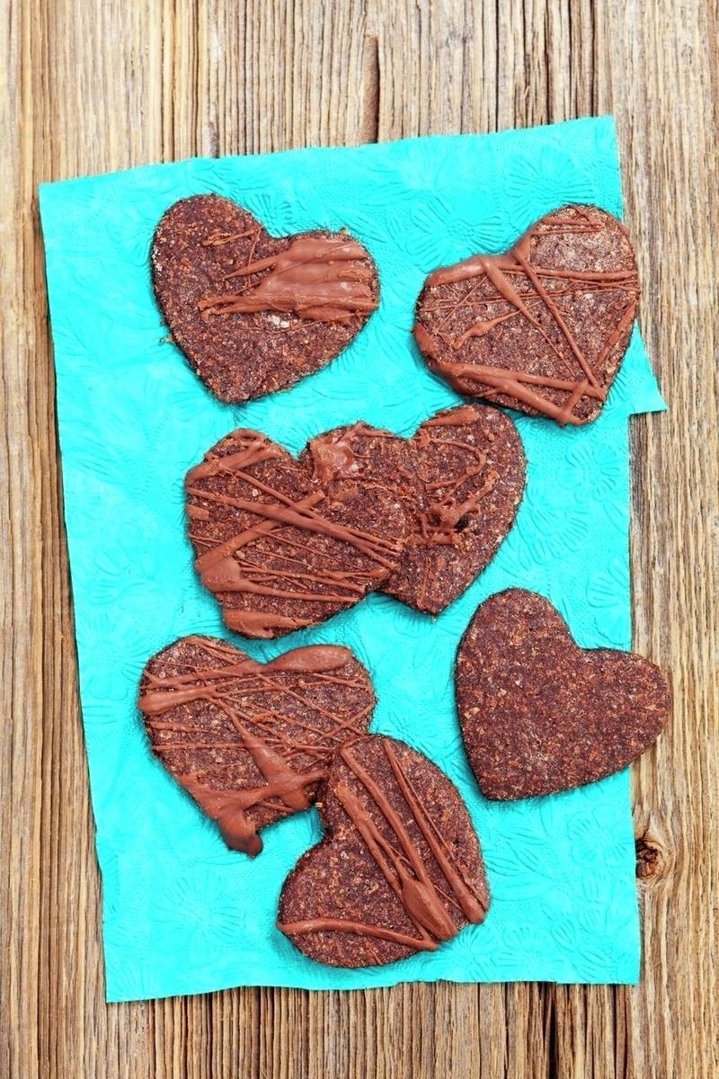 Heartshaped wholemeal chocolate biscuits (seen from above) Stock
