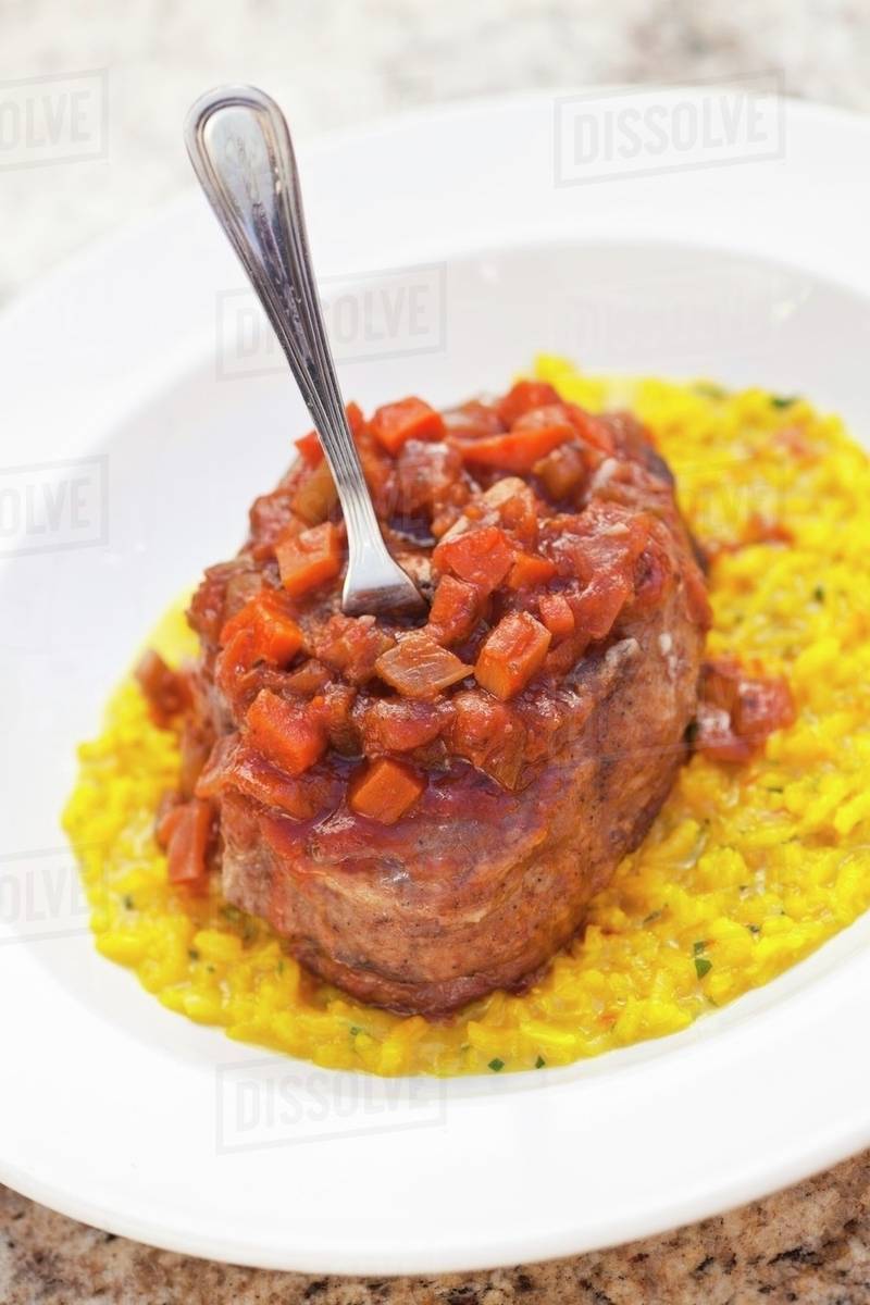 Osso Buco with Risotto alla Milanese (Italy) Stock Photo Dissolve