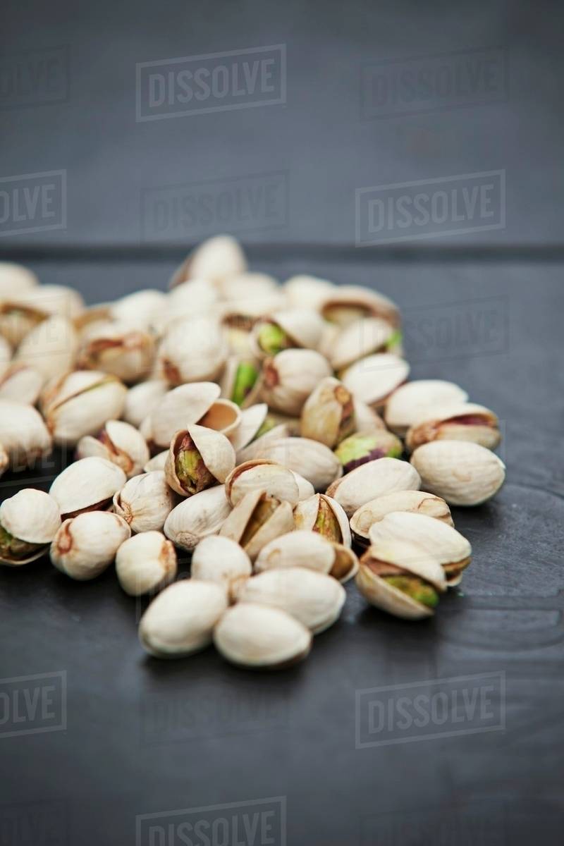 Unshelled pistachios Stock Photo Dissolve