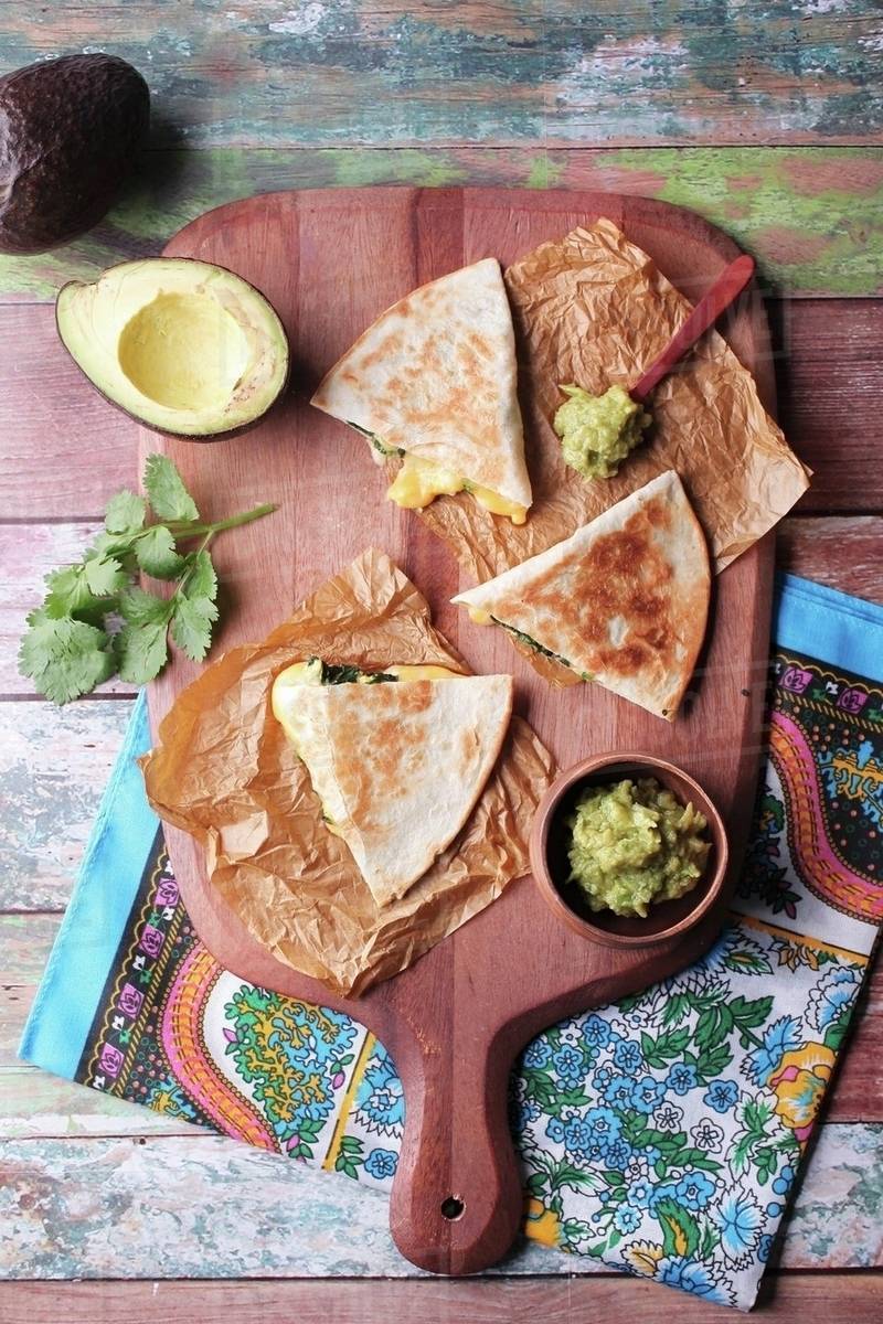 Quesadillas with guacamole (Mexico) Stock Photo Dissolve