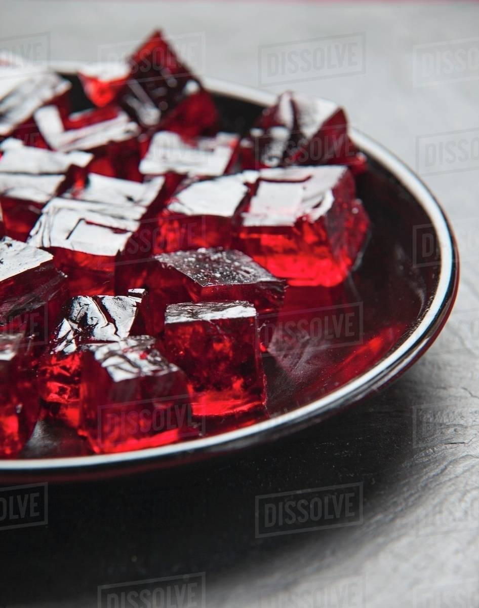 Jelly cubes on a plate Stock Photo Dissolve