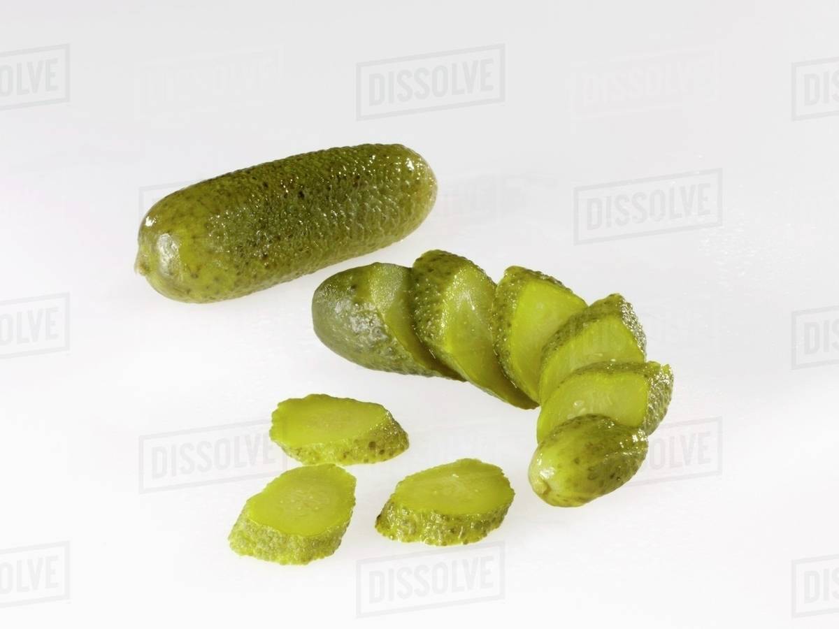 Pickles, whole and sliced Stock Photo Dissolve