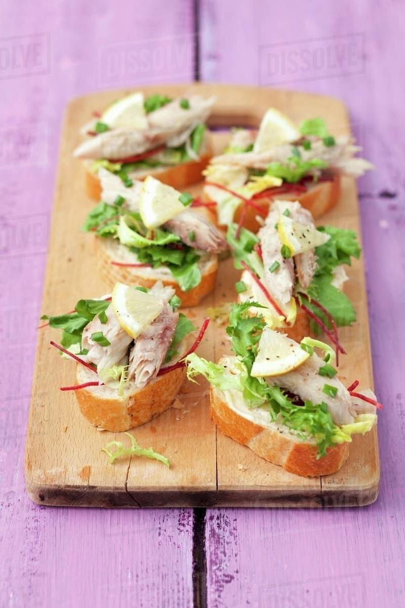 Canapes with smoked mackerel, lettuce and beetroot Stock Photo Dissolve