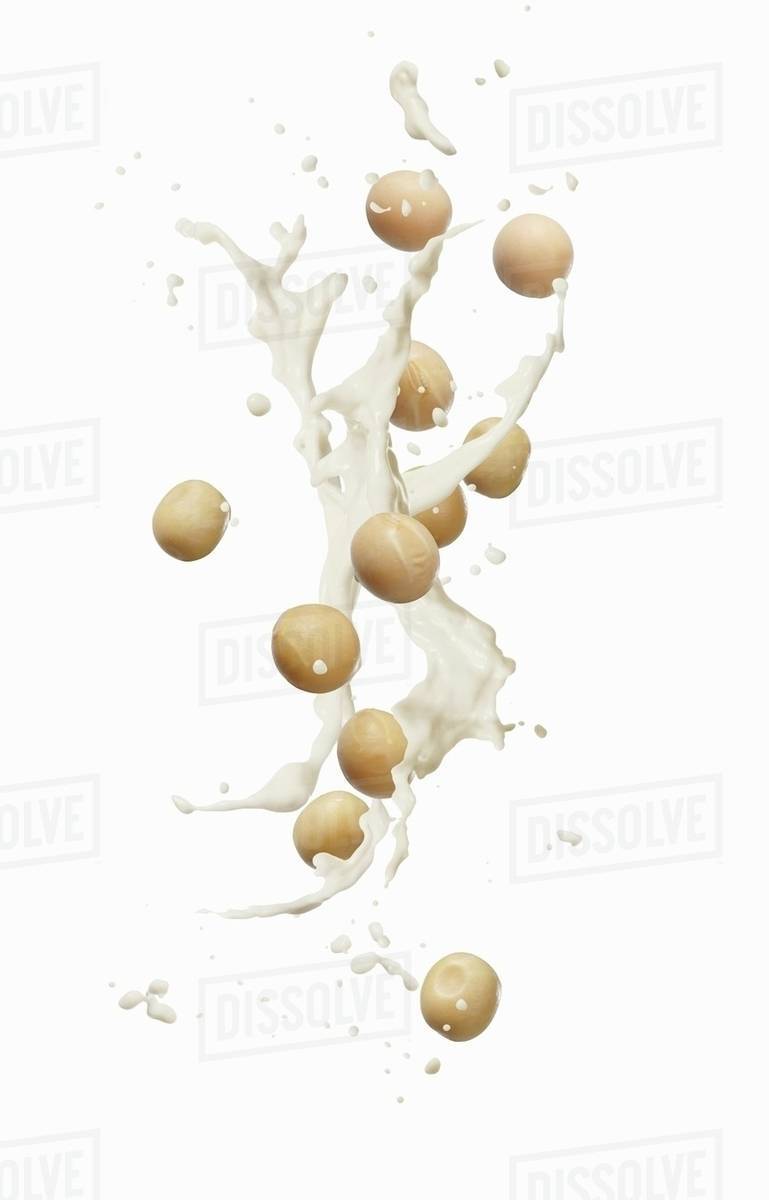 A splash of soy milk Stock Photo Dissolve
