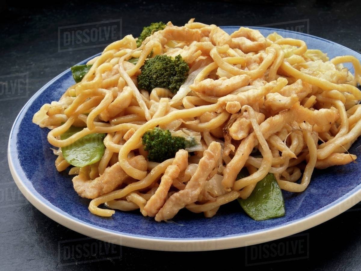 Chicken Lo Mein with broccoli Stock Photo Dissolve