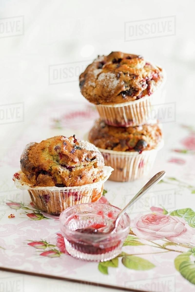 Blueberry muffins with jam Stock Photo Dissolve