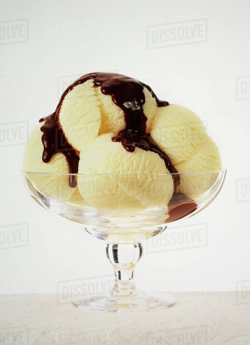 Vanilla ice cream with chocolate sauce Stock Photo Dissolve