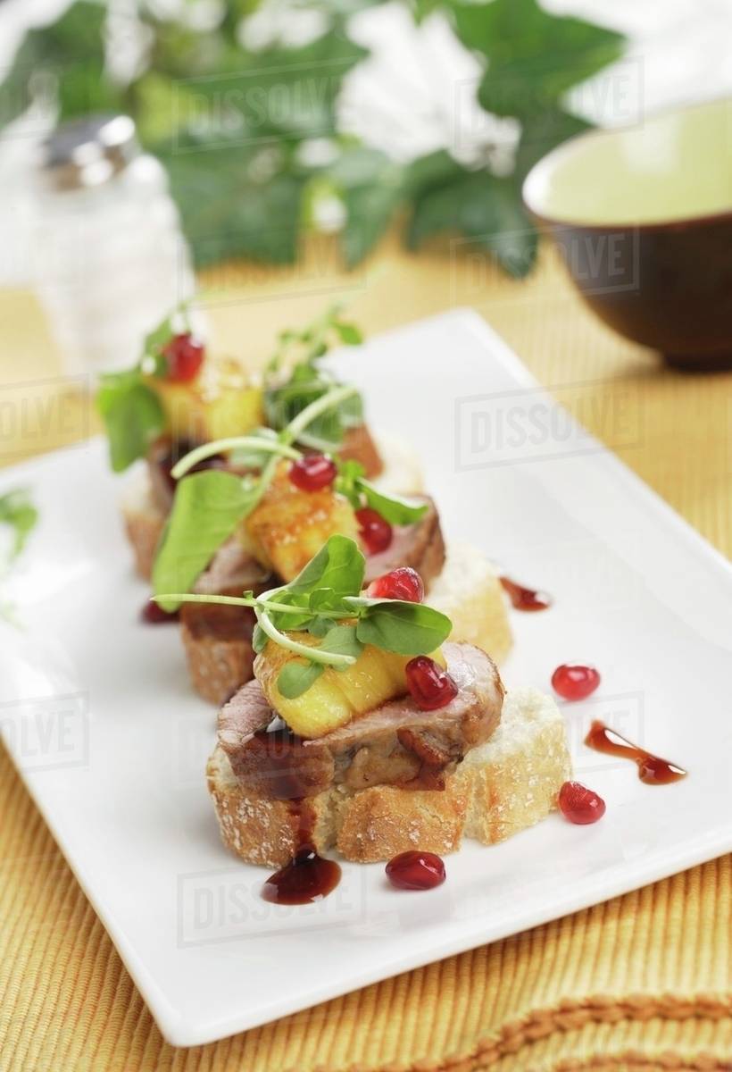 Canape pork tenderloin with pineapple and raspberry vinegar Stock