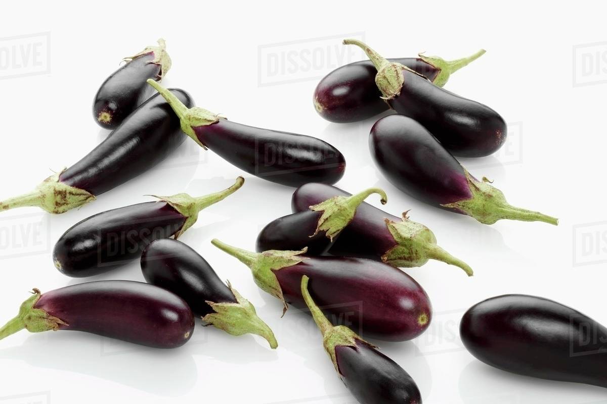 Lots of baby aubergines Stock Photo Dissolve